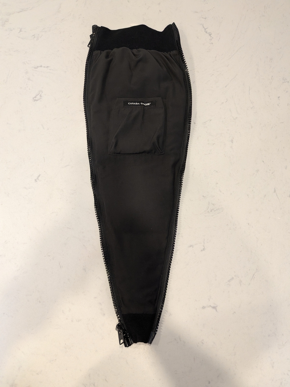 Canada Goose "Goose Bump" Extension Panel designed to zip directly into compatib